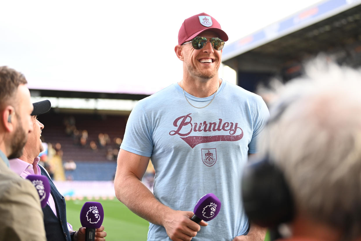 J.J. Watt is interviewed prior to the Premier League match between Burnley and Manchester City on August 11, 2023. (Michael Regan/Getty Images)