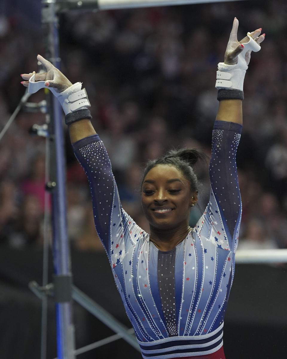 Simone Biles lands after the uneven bars at the United States Gymnastics Olympic Trials on Friday, June 28, 2024 in Minneapolis. (AP Photo/Abbie Parr)