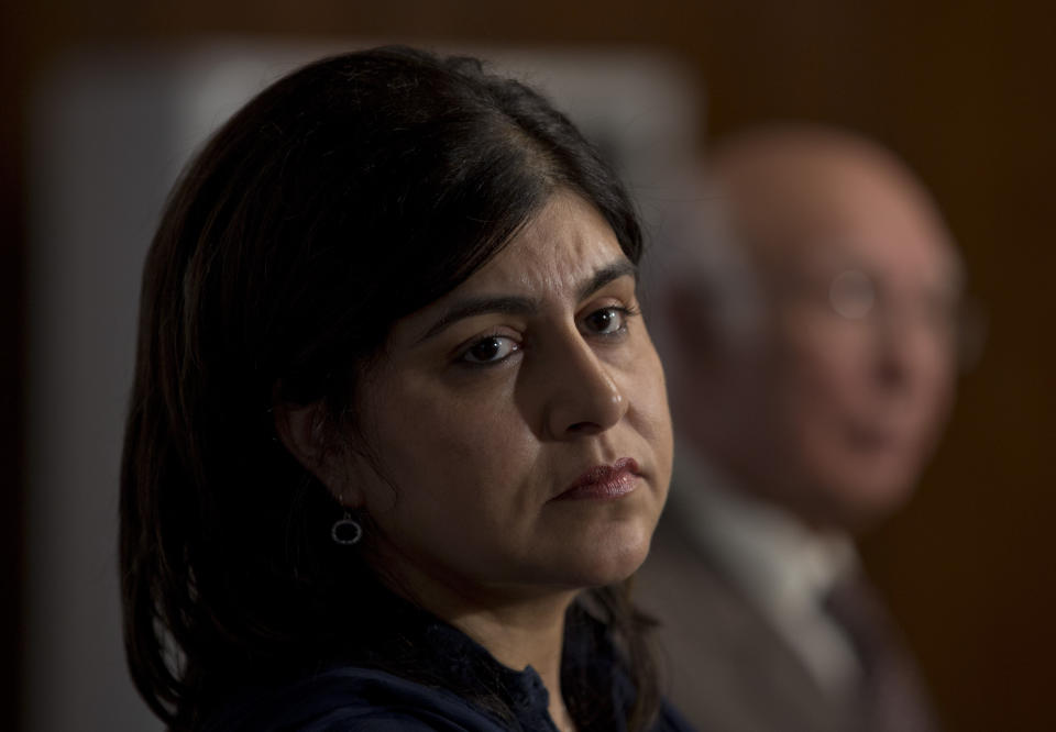 Baroness Sayeeda Warsi, British senior minister of state at the Foreign and Commonwealth Office, listens to a reporter during a joint news conference with Sartaj Aziz in Islamabad, Pakistan, Thursday, Oct. 3, 2013. Warsi met Pakistani officials and leadership to discus various bilateral, regional and international issues. (AP Photo/B.K. Bangash)