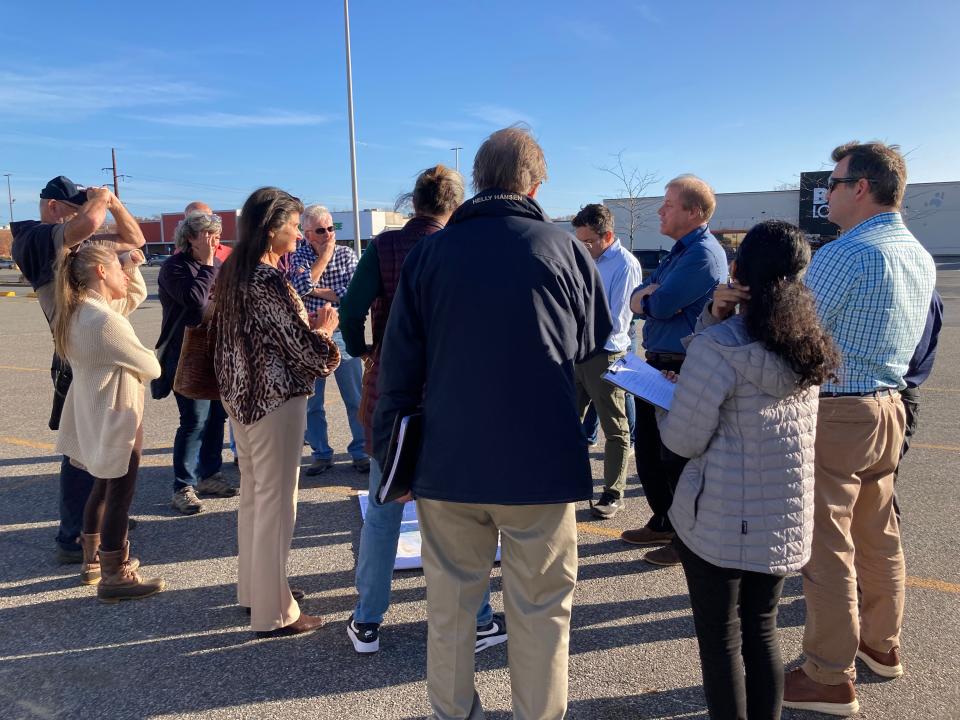 Fairhaven residents and planners stop to discuss the potential of future plans for Fairhaven's plazas and ask questions.