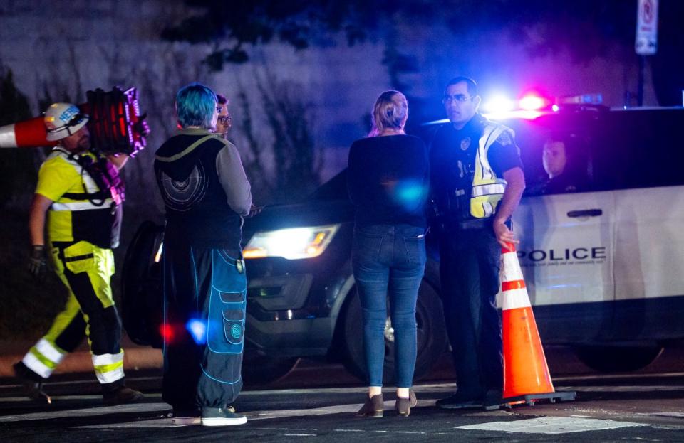 Neighborhood residents speak to Austin Police officers in Austin, Texas late Tuesday, Dec. 5, 2023. (©Sara Diggins/American-Statesman)