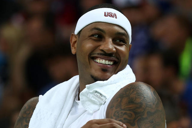 New York Knicks Carmelo Anthony and J.R. Smith smile at each other