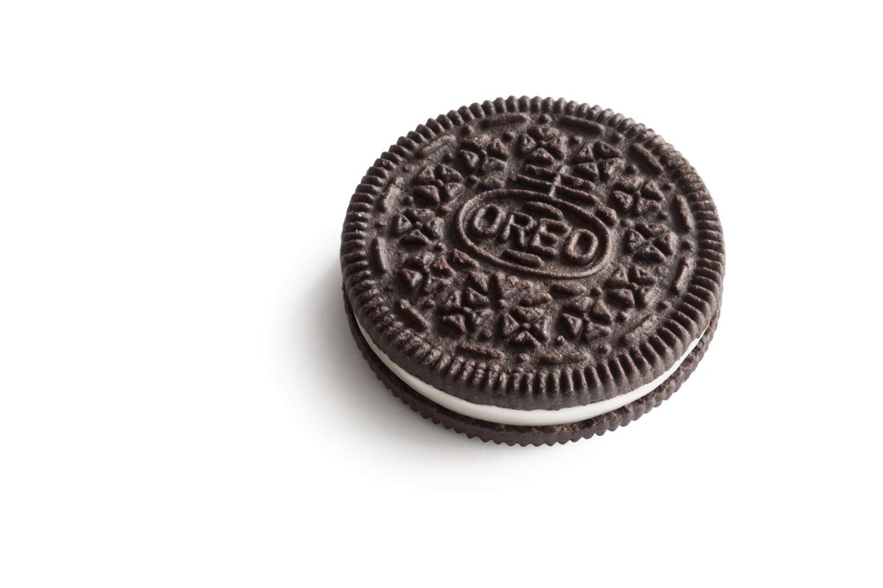 Сoimbra, Portugal - October 23, 2014: A single Oreo cookie, on white.  Oreo's Nabisco brand is a subsidiary of Mondelēz International.