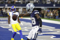 Dallas Cowboys wide receiver CeeDee Lamb (88) celebrates his touchdown during the first half of an NFL football game against the Los Angeles Rams, Sunday, Oct. 29, 2023, in Arlington, Texas. (AP Photo/Roger Steinman)