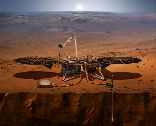 An NASA illustration of the InSight lander on Mars and the dome-shaped quake detector that has picked up seismic rumbles