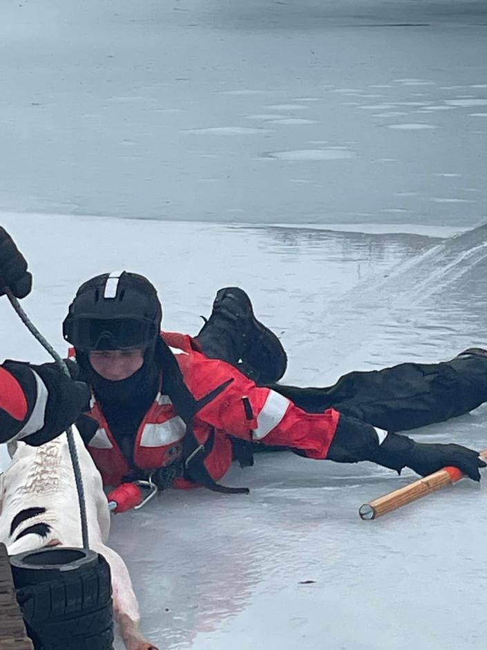 A five-member Coast Guard team successfully rescued a stranded dog caught in the icy Detroit River near Belle Isle on the afternoon of Saturday, Dec. 31, 2022.