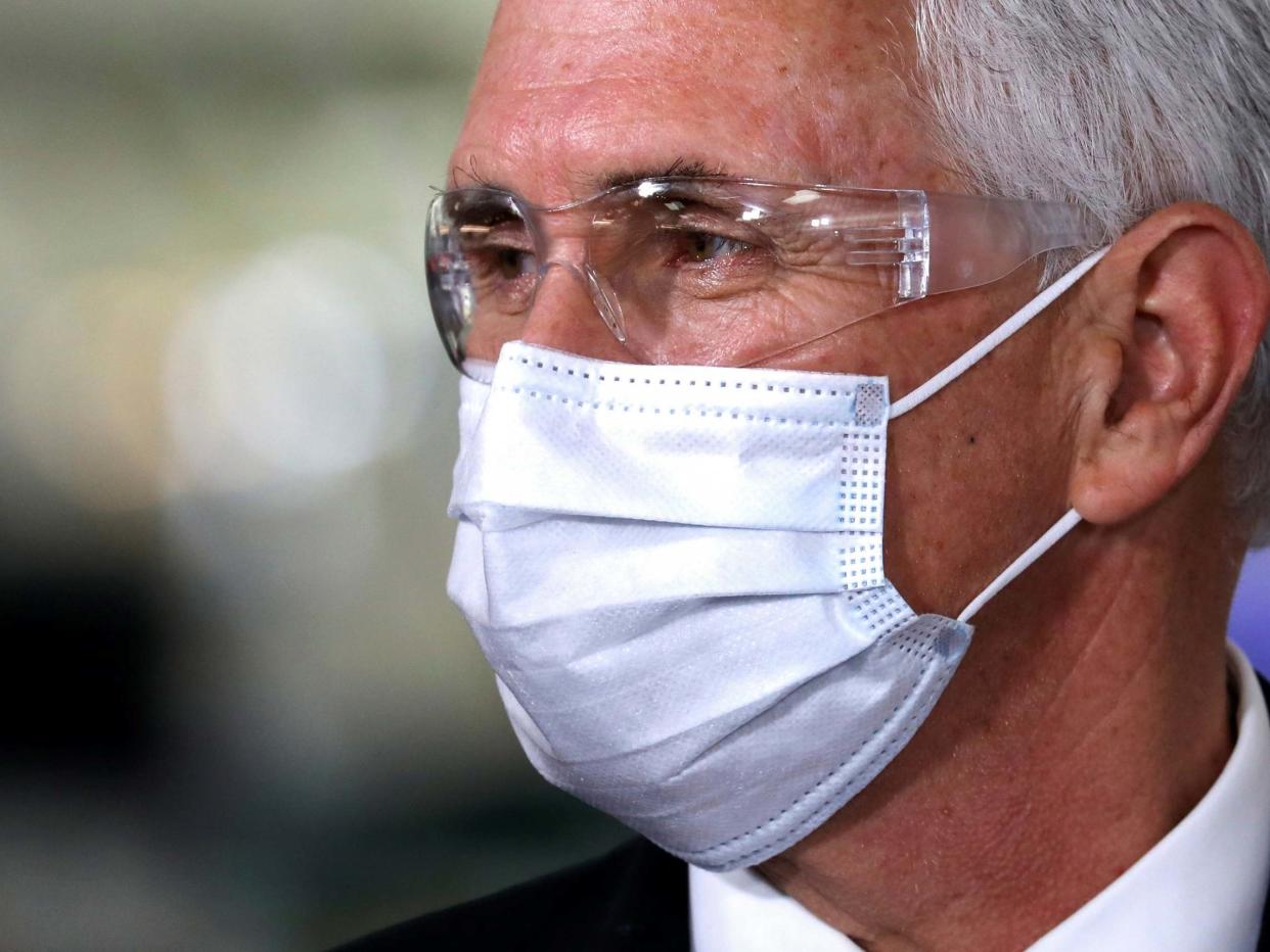 US vice president Mike Pence work a mask on a visit to the General Motors plant in Indiana, after earlier criticism: REUTERS