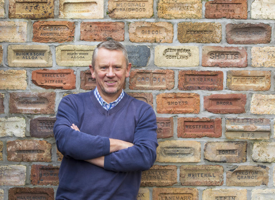 Brick by brick: Proud Mark Cranston with part of his huge collection. (SWNS)