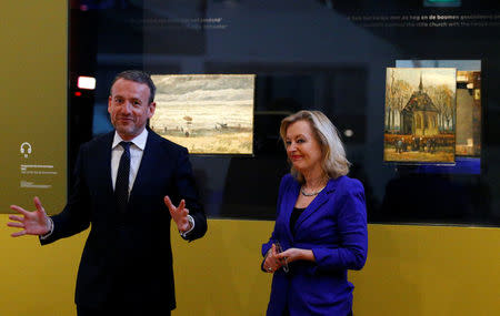 Museum director Axel Ruger and Dutch Minister of Education, Culture and Science Jet Bussemaker reveal two recovered paintings by Vincent van Gogh, which were stolen from the museum in 2002, at the van Gogh Museum in Amsterdam, Netherlands March 21, 2017. REUTERS/Michael Kooren