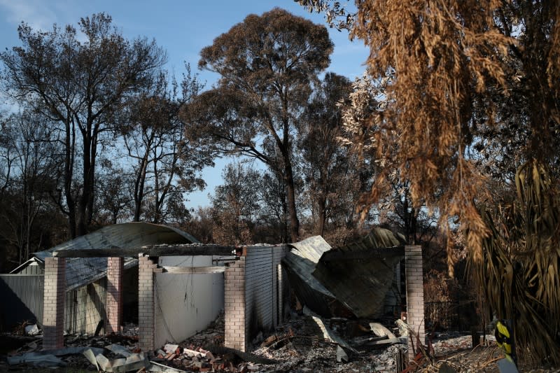 The remnants of a destroyed home, burnt in the recent bushfires, is pictured in Conjola Park