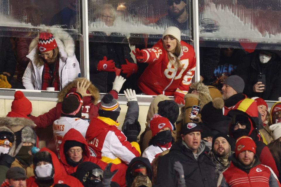 kansas city, missouri january 13 taylor swift celebrates with fans during the afc wild card playoffs between the miami dolphins and the kansas city chiefs at geha field at arrowhead stadium on january 13, 2024 in kansas city, missouri photo by jamie squiregetty images