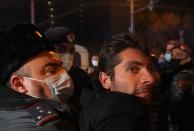 People attend an opposition rally in Yerevan