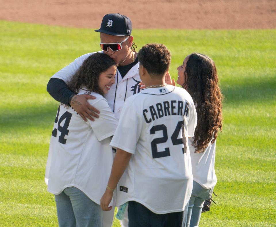 Miguel Cabrera hugs and kisses his kids after he leaves the field for the final time as the Detroit Tigers take on the Cleveland Guardians at Comerica Park in Detroit, Sunday, Oct. 1, 2023 marking the final game that Miguel Cabrera will play for the Tigers.