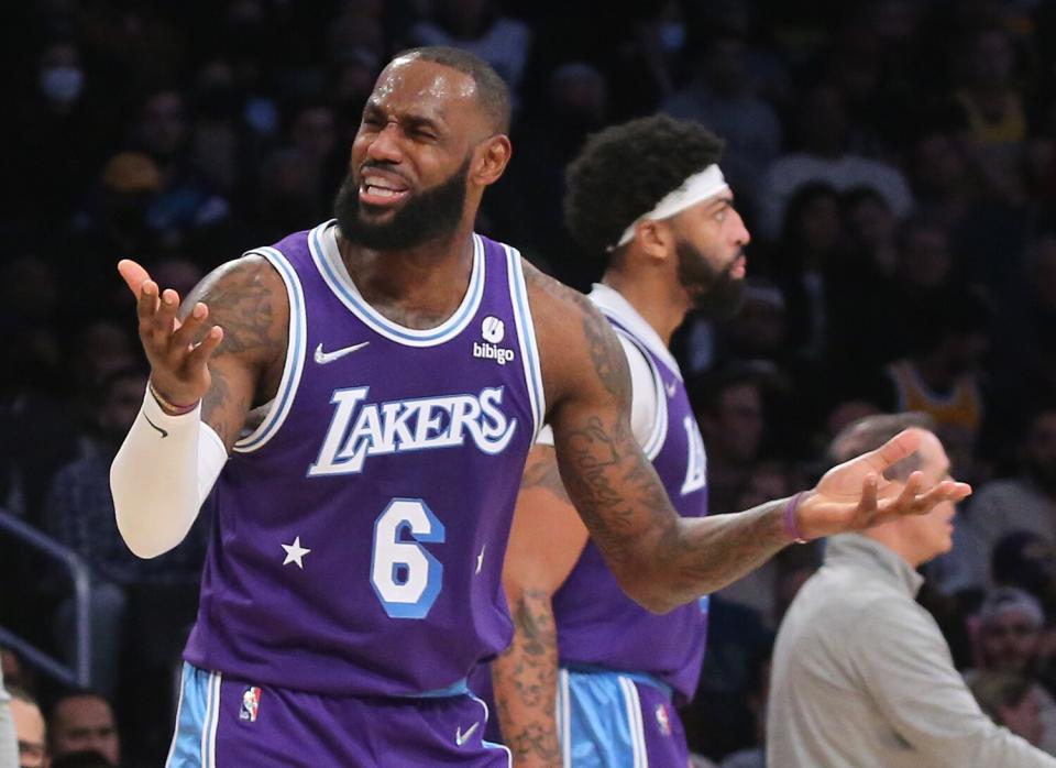 Lakers forward LeBron James reacts to being called for a foul against the Clippers in the third quarter Friday.