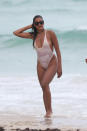<p>Reality star Claudia Jordan wore a see-through one-piece style on the beach in Miami in June 2017. (Photo: Pacific Coast News) </p>