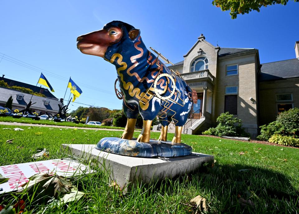 Oxford Public Library's Slater's Sheep, sponsored by Swissturn/USA, is called Maizy made of metal components created by artists Rebecca Hope and Corey Mitchell.