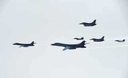 U.S. B-1B Lancer flies over South Korea during a joint live-fire drill in this handout picture provided by South Korean Air Force and relased by Yonhap on July 8, 2017. South Korean Air Force/Yonhap via REUTERS