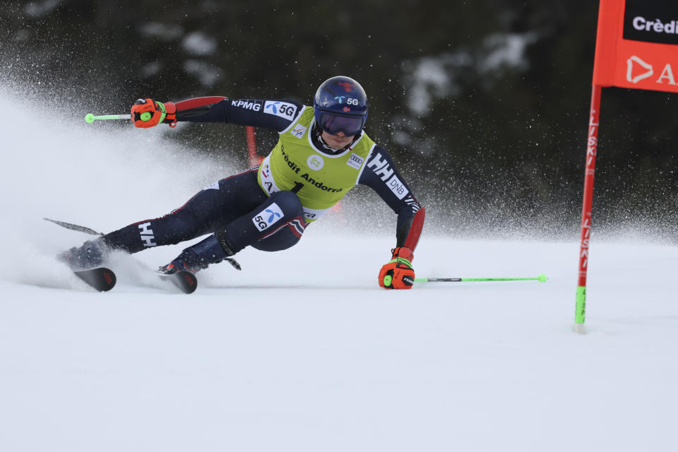 Norway's Henrik Kristoffersen speeds down the course during a men's World Cup giant slalom race, in Soldeu, Andorra, Saturday, March 18, 2023. (AP Photo/Alessandro Trovati)