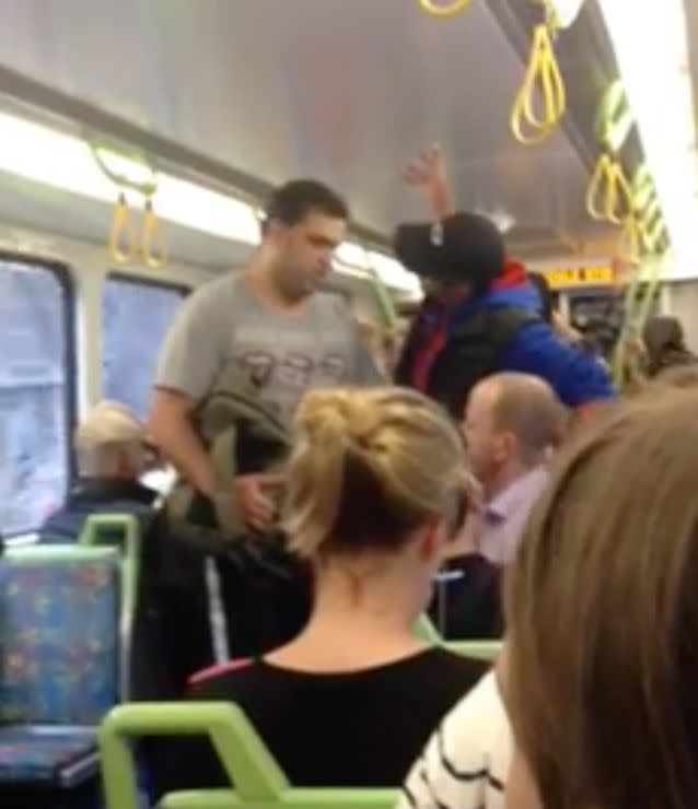 The man manically turned his attention to the man in the purple shirt, now sitting down on a seat, pointing and gesturing violently at him. Photo: Facebook