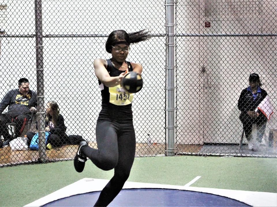 Mount Vernon's Tianna Stewart prepares to throw the weight after making the finals of the girls invitational during the U.S. Army Officials Hall of Fame track meet January 21, 2013 at The Armory. She finished fifth with a personal-best throw.