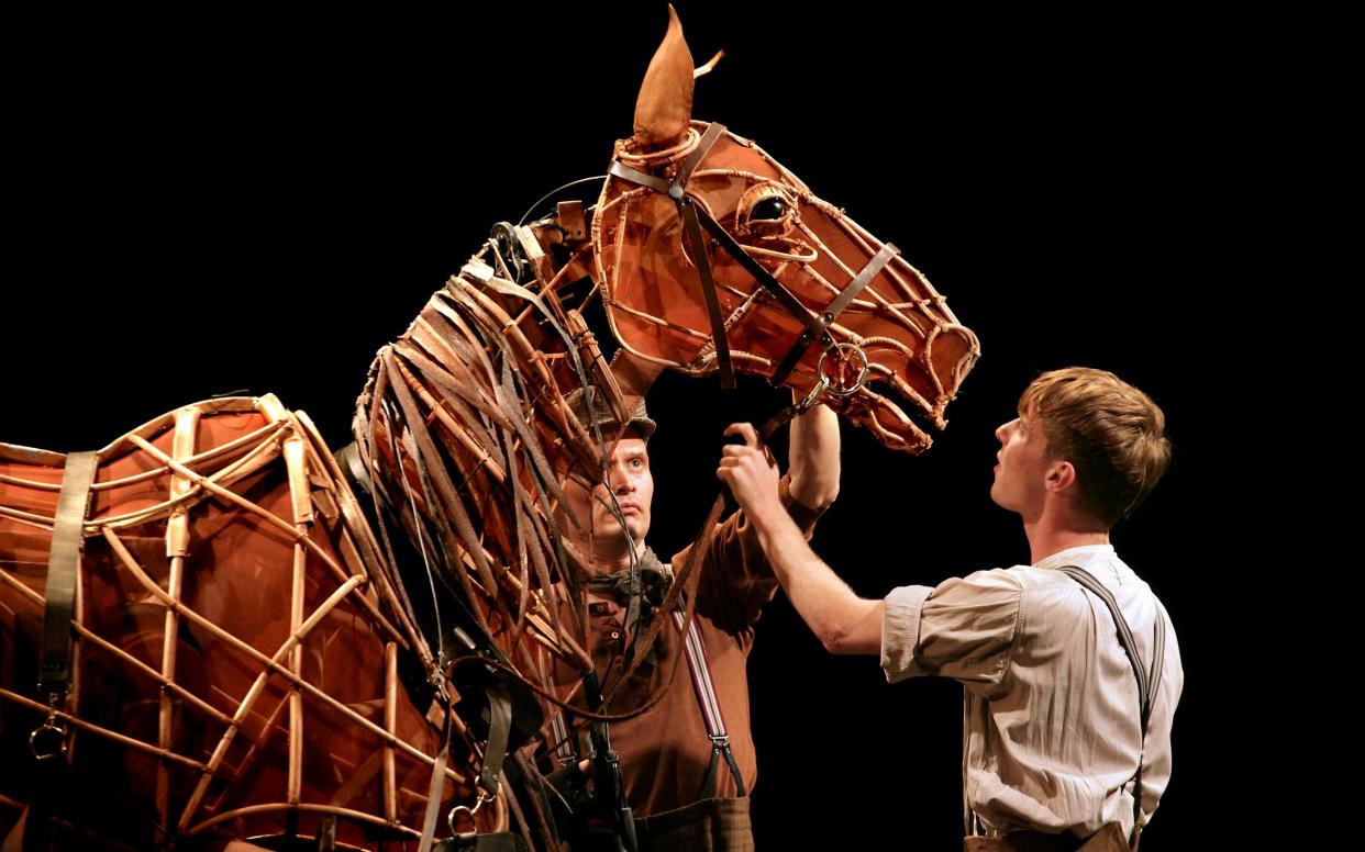 Luke Treadaway (right) in War Horse at the National Theatre -  Simon Annand
