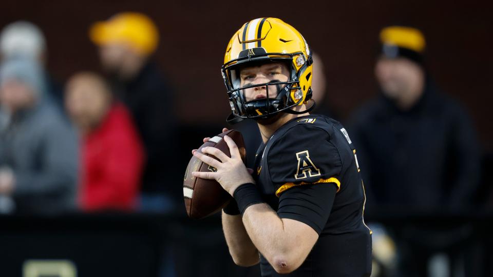 Appalachian State quarterback Chase Brice throws before a game against Georgia State on Oct. 19, 2022, in Boone, N.C.