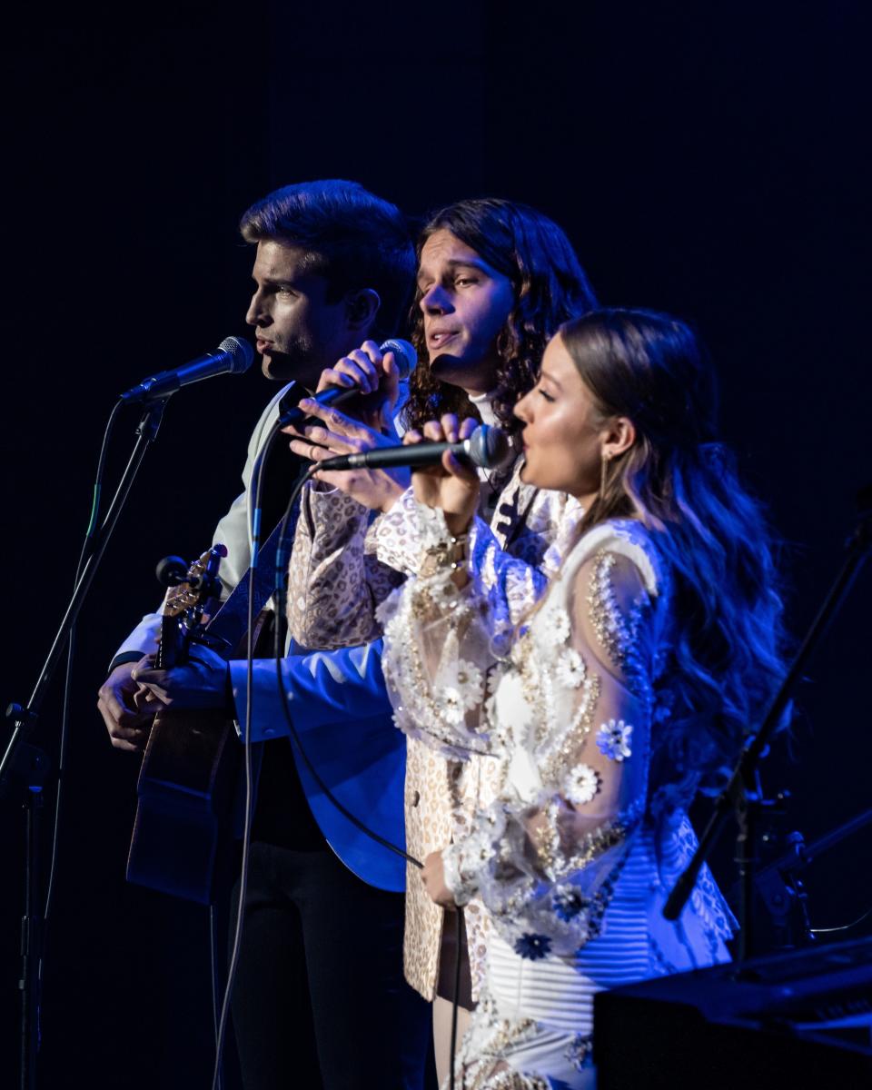 Girl Named Tom, the sibling singing trio of Caleb, left, Joshua and Bekah Liechty with ties to South Bend and Goshen, won Season 21 of "The Voice" in December 2021.