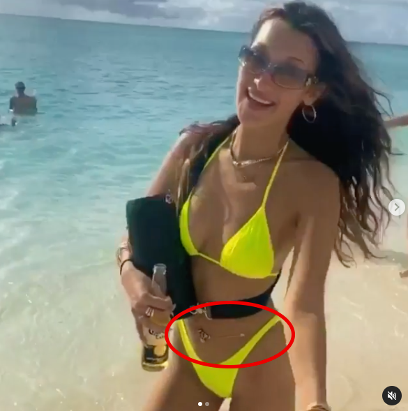 Bella Hadid wears body chain in beach photo