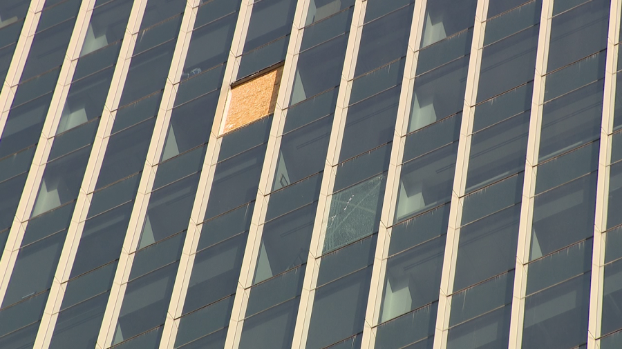 The Denver Police Department is investigating how and why a glass window broke from a tall building downtown on Sunday. (KDVR)