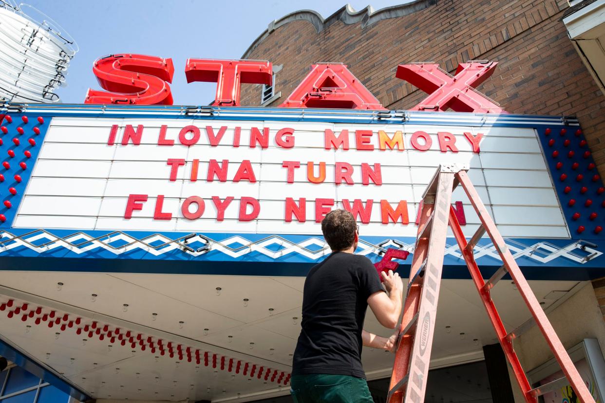 Jeff Kollath, the museum director for the Stax Museum of American Soul Music, climbs up a ladder to finish spelling out Tina Turner’s name on the museum’s marquee in remembrance of her and Floyd Newman in Memphis, Tenn., on Thursday, May 25, 2023. Turner, a two-time Rock 'n’ Roll Hall of Famer, a 12-time Grammy winner and one of the most enduring hitmakers in history, and Newman, a baritone saxophonist and key figure in the development of Stax Records, both died earlier that week.