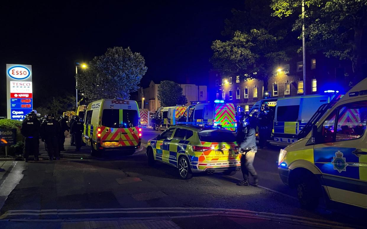 Riot police outside Southport Police Station