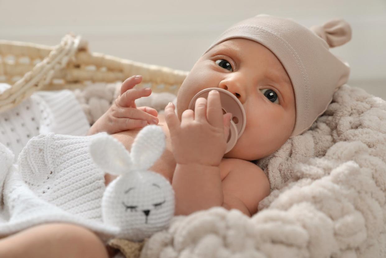 Substance use during pregnancy can lead to a broad array of harmful effects. <a href="https://www.gettyimages.com/detail/photo/adorable-newborn-baby-with-pacifier-and-toy-in-royalty-free-image/1407722363?phrase=baby" rel="nofollow noopener" target="_blank" data-ylk="slk:Liudmila Chernetska/iStock via Getty Images Plus;elm:context_link;itc:0;sec:content-canvas" class="link ">Liudmila Chernetska/iStock via Getty Images Plus</a>