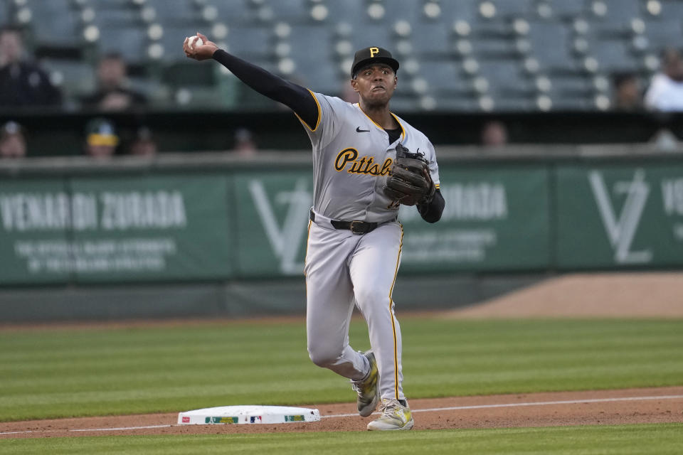 Pittsburgh Pirates third baseman Ke'Bryan Hayes throws out Oakland Athletics' Nick Allen at first base during the third inning of a baseball game in Oakland, Calif., Monday, April 29, 2024. (AP Photo/Jeff Chiu)