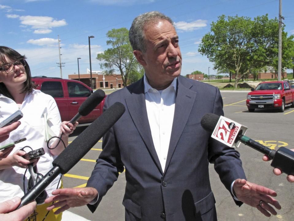 Russ Feingold, a Democratic candidate for the U.S. Senate, speaks to reporters in Madison, Wis. (Photo: Scott Bauer/AP)