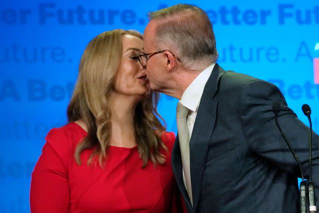 <p>AP Photo/Rick Rycroft</p> Anthony Albanese shares a kiss with Jodie Haydon at a Labor Party event in Sydney, Australia, May 22, 2022