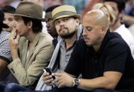 Leonardo DiCaprio sits court-side as the New Orleans Hornets take on the Los Angeles Lakers in New Orleans, April 9, 2012.