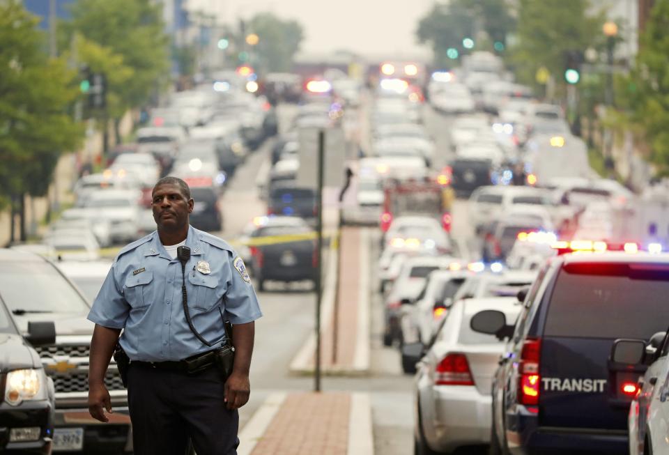 Police respond to reports of a shooting and subsequent lockdown at the U.S. Navy Yard in Washington July 2, 2015. (REUTERS/Jonathan Ernst)