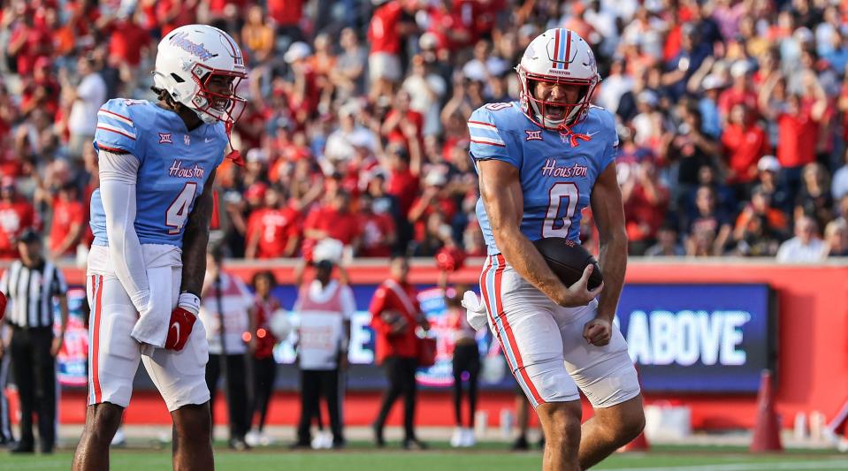 Houston wide receiver Joseph Manjack IV celebrates after scoring a touchdown in the Cougars' 2023 season-opener against UTSA.