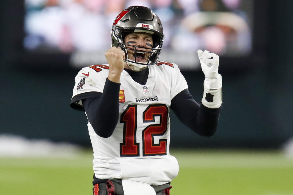 Tampa Bay Buccaneers quarterback Tom Brady reacts after winning the NFC championship NFL football game against the Green Bay Packers in Green Bay, Wis., Sunday, Jan. 24, 2021. The Buccaneers defeated the Packers 31-26 to advance to the Super Bowl. (AP Photo/Matt Ludtke)