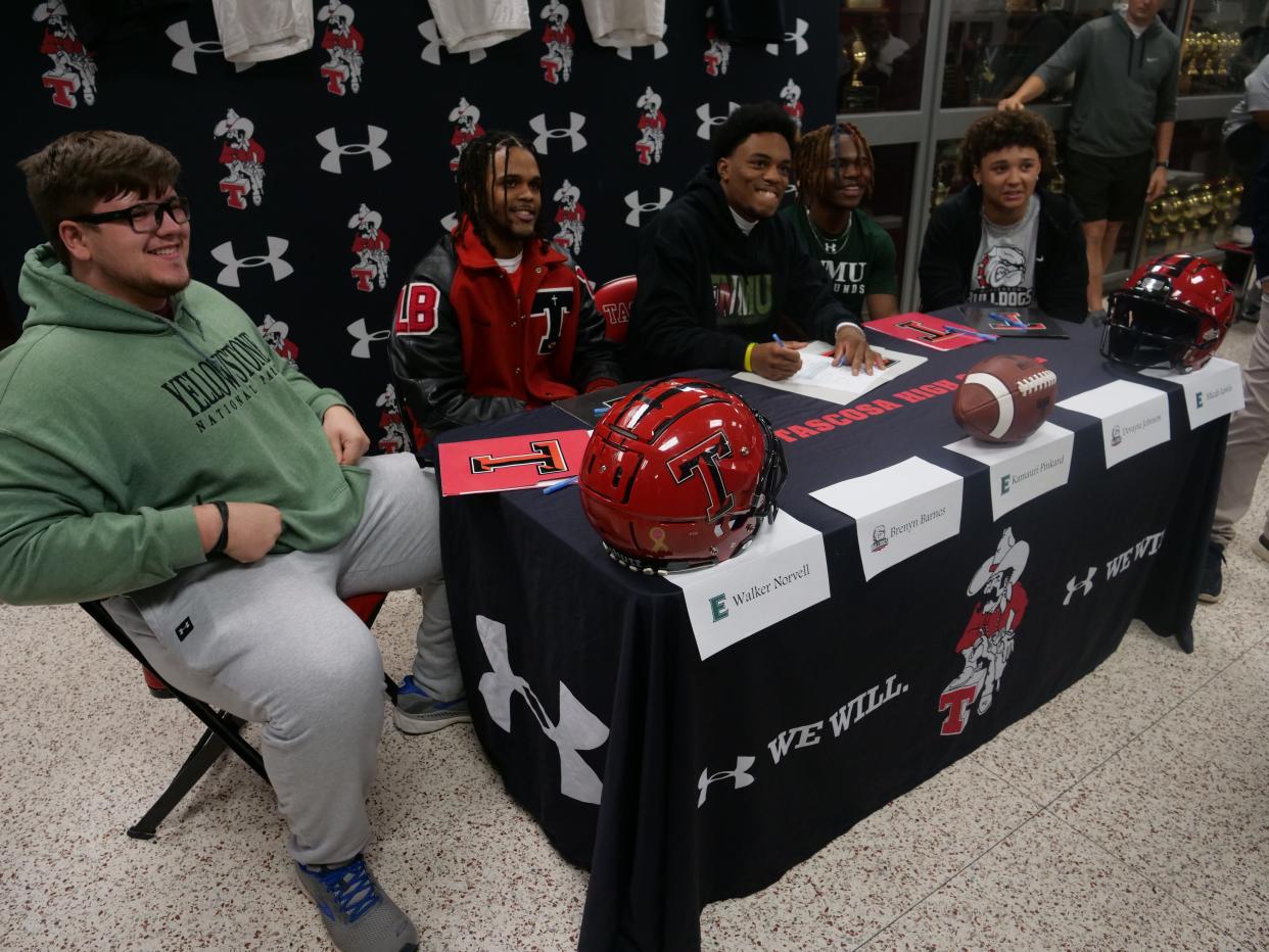 Five Tascosa athletes signed their National Letters of Intent to play college football as part of National Signing Day on Wednesday, February 1st, 2023 at Tascosa High School. From left, Walker Norvell, Brenyen Barnes, Kemauri Pinkard, Micah Lewis, and Devayne Johnson.