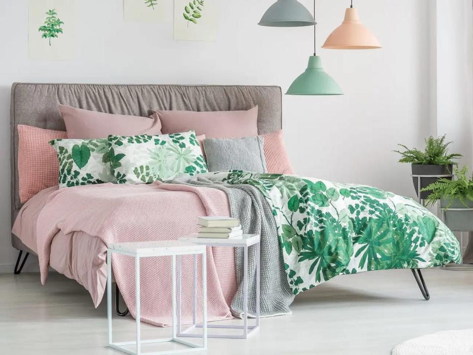 Bed with pink and green sheets