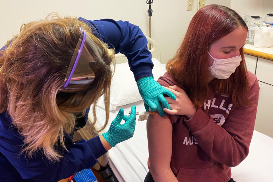 Katelyn Evans, 16, receives a Covid-19 vaccine during a trial at Cincinnati Children's Hospital Medical Center on Oct. 14. (Cincinnati Children's Hospital Medical Center)