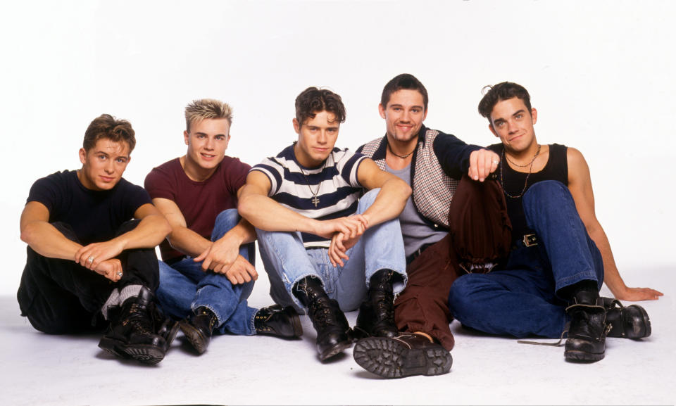 English boy band Take That, portrait, United Kingdom, 1992. Mark Owen, Gary Barlow, Jason Orange, Howard Donald, Robbie Williams. (Photo by Tim Roney/Getty Images)