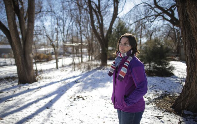 Kerri Rawson stands in the backyard of the vacant lot that was once the site of her childhood home. She says her father, Dennis Rader, was a good father, even while murdering 10 people and using his family to create cover stories.