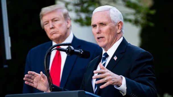 PHOTO: Vice President Mike Pence speaks with President Donald J. Trump and members of the coronavirus task force during a briefing in the Rose Garden at the White House, April 27, 2020, in Washington. (abin Botsford/The Washington Post via Getty Images)