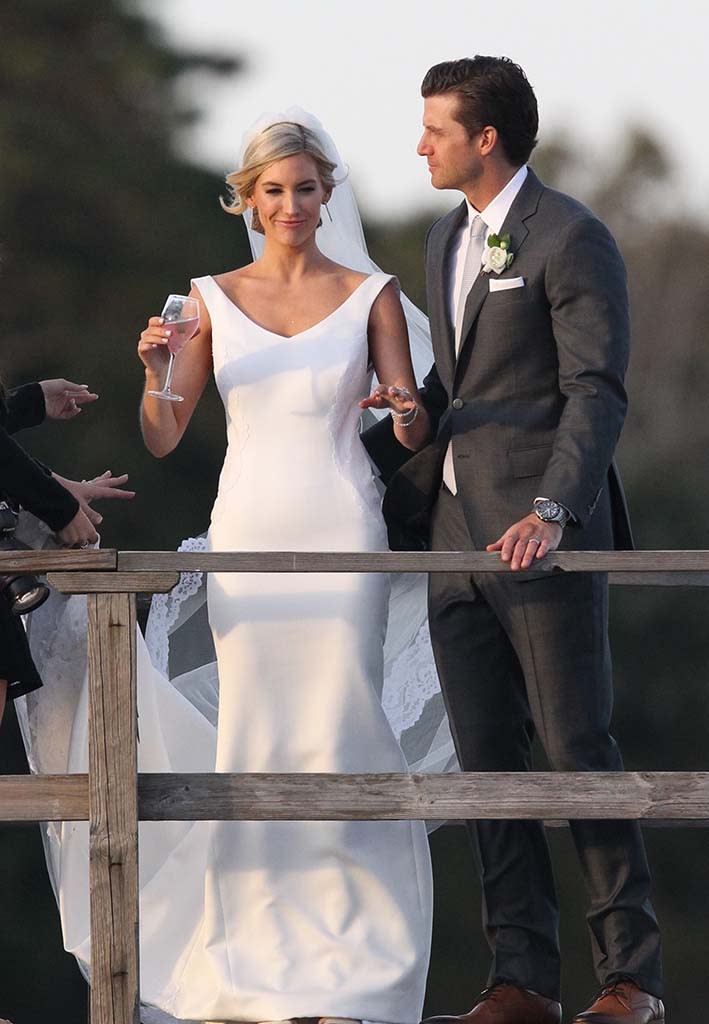 <p>She finally got her happy ending! Bischoff, who was given Chris Soules’s final rose on the season finale of <em>The Bachelor</em> in 2014 (before calling it off six months later), said “I do” to Angel at the Wequassett Resort and Golf Club on Cape Cod in Massachusetts, on Saturday. Former Bachelorette Kaitlyn Bristowe and her fiancé, Shawn Booth, as well as <em>Bachelor in Paradise</em> cuties Carly Waddell and Evan Bass were in attendance to watch their pal make it official. (Photo: Patriot Pics/BACKGRID) </p>