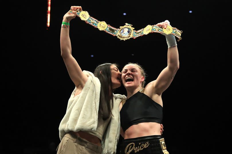 Lauren Price (right) celebrates with girlfriend Karriss Artingstall following victory against Kirstie Bavington in the Inaugural British Female Welterweight Championship bout last year