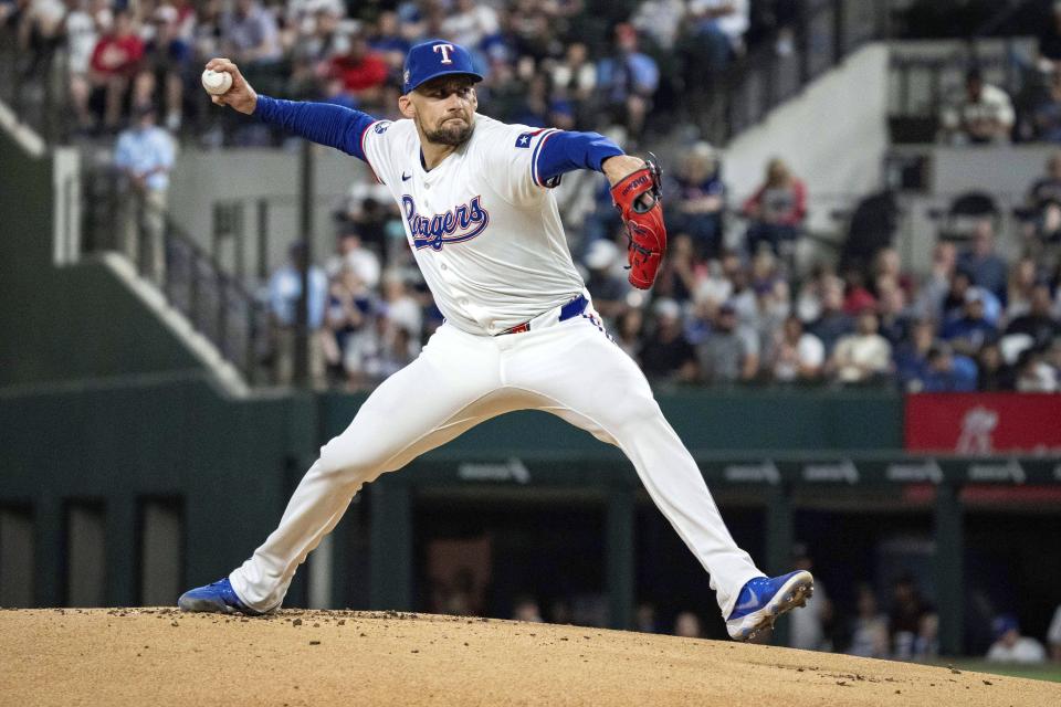 Texas Rangers starting pitcher Nathan Eovaldi works against the Arizona Diamondbacks during the first inning of a baseball game Tuesday, May 28, 2024, in Arlington, Texas. (AP Photo/Jeffrey McWhorter)