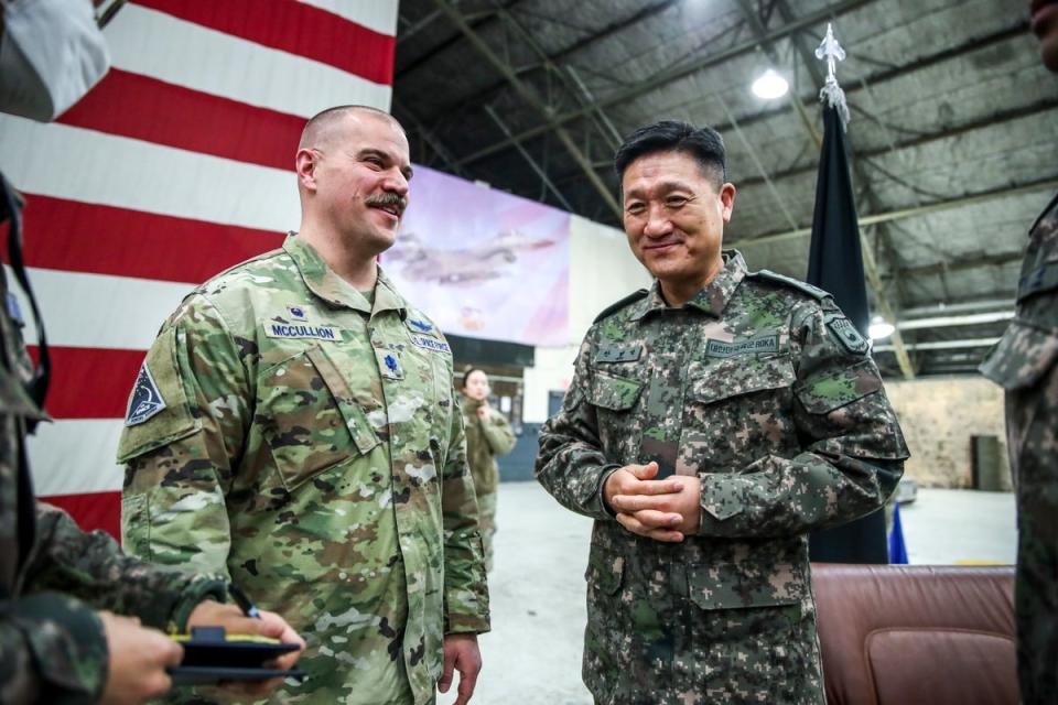 Lt Col Joshua McCullion, Commander of the US Space Forces Korea, talks with South Korean Gen. Ahn Byung-seok, deputy commander of the South Korea-US Combined Forces Command (EPA)