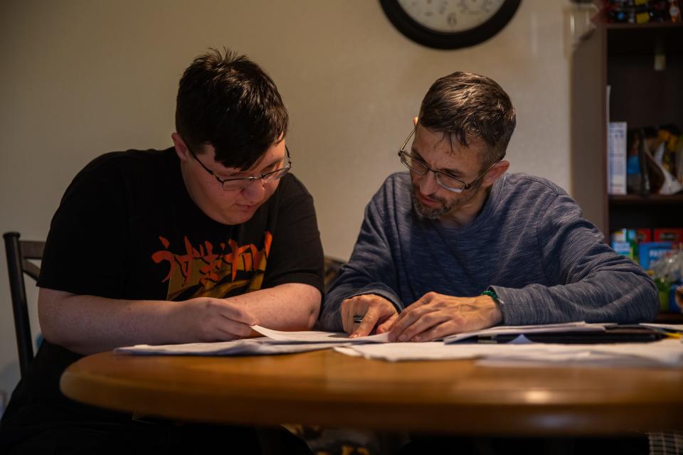 Dwight Severe (left) and his father, Jason Edwards (right), in their unit at Marana Apartments. The complex opened in 2003. If it had remained in the LIHTC program for its full 30 years, it would have stayed affordable until at least 2033.